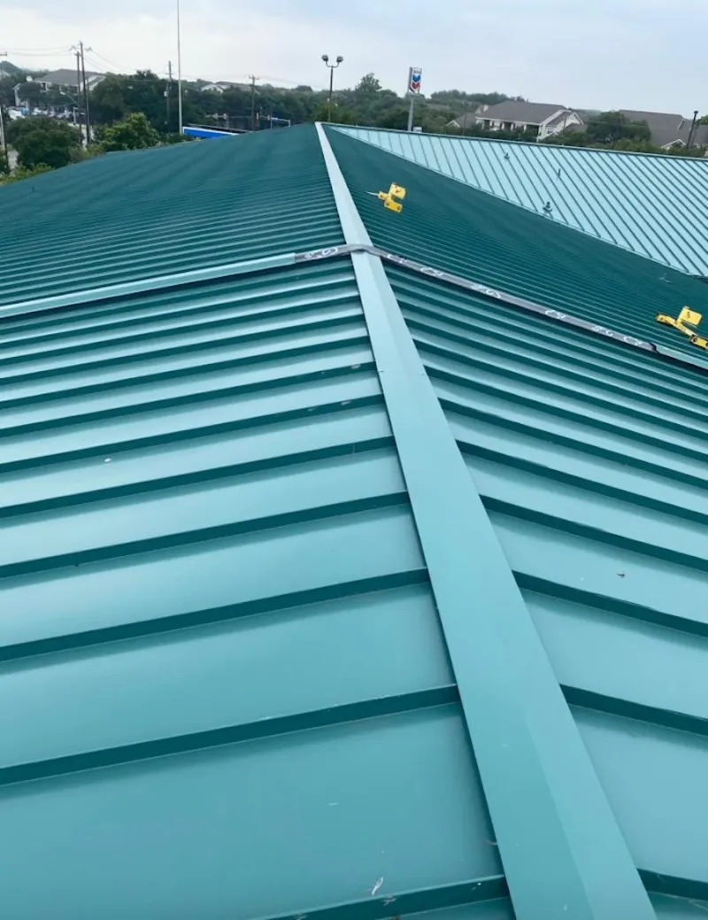 Green commercial metal roof ridge and valley for Metal Roof Repair in Pueblo West